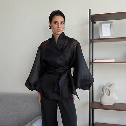 Elegant Noir Kimono by Serena Ken, featuring flowing fabric and intricate detailing, perfect for any stylish wardrobe.
