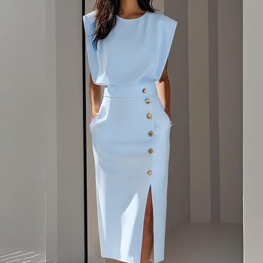 Serena Ken Céleste dress in flowing fabric with elegant design, displayed on a mannequin.