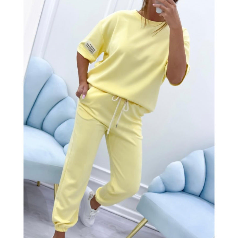 Serena Ken Lilas clothes featuring soft fabric and stylish design, displayed on a hanger with a neutral background.
