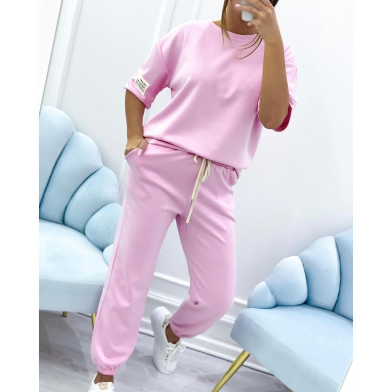 Serena Ken Lilas clothes featuring soft fabric and stylish design, displayed on a hanger against a neutral background.