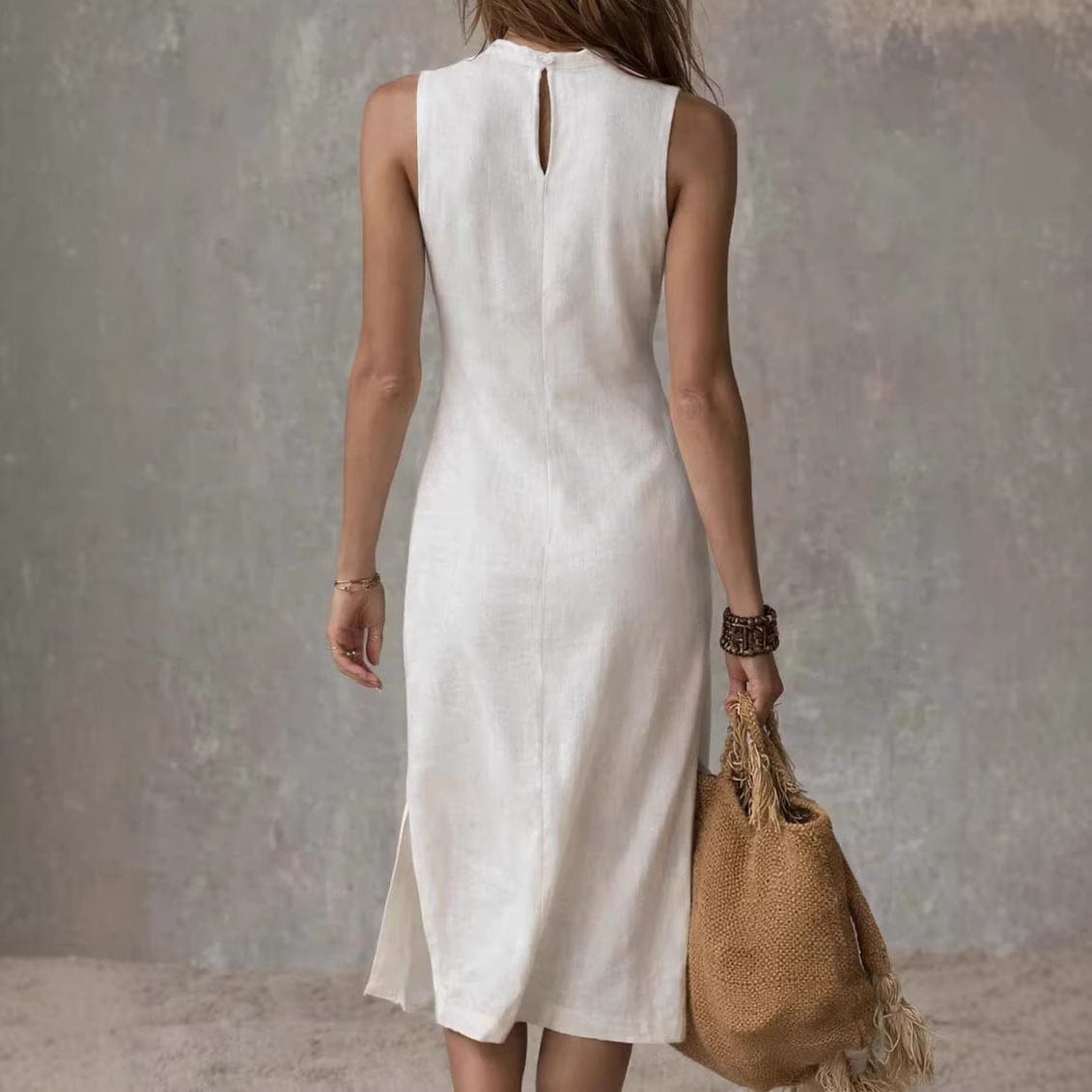 Serena Ken Blanche Riviera dress featuring a flowing design with floral patterns, perfect for elegant summer occasions.