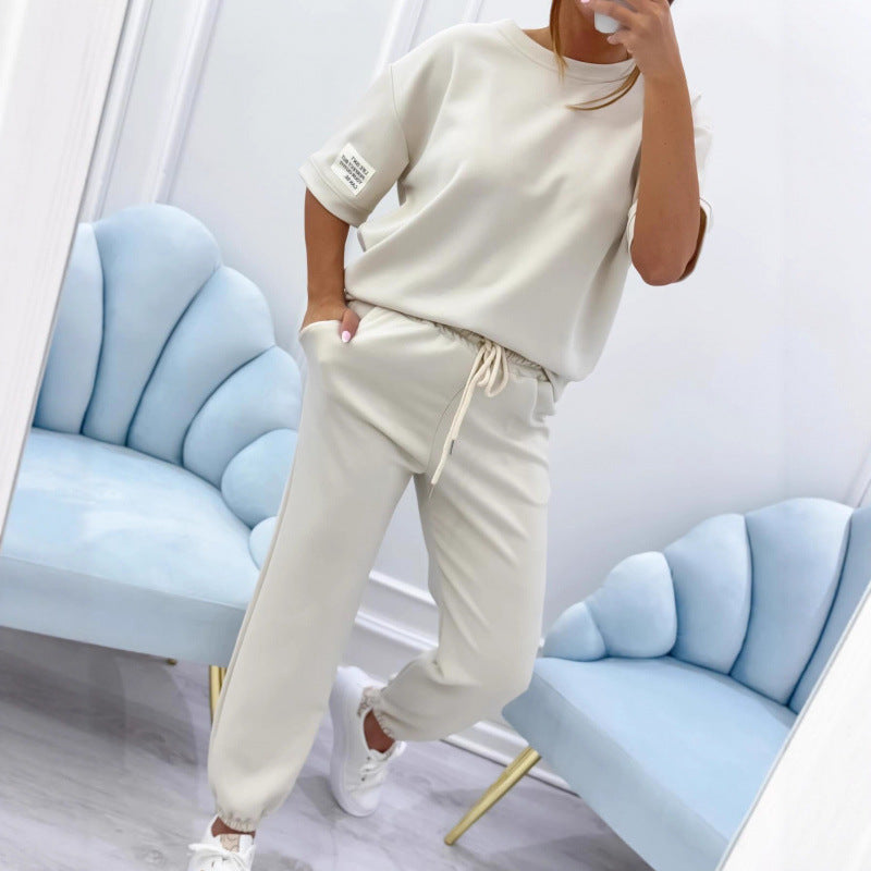 Serena Ken Lilas clothes featuring soft fabric and stylish design, displayed on a hanger against a neutral background.