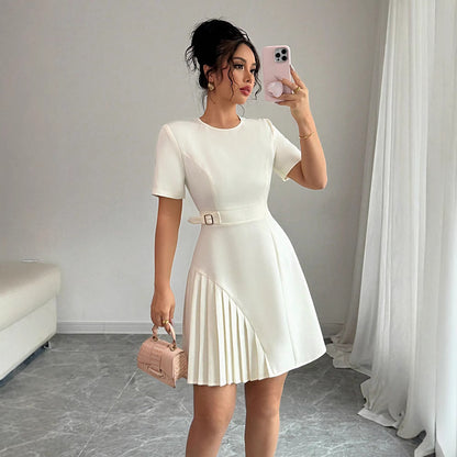 Serena Ken Amélia dress featuring a stylish, flowing design with intricate details and a flattering silhouette.